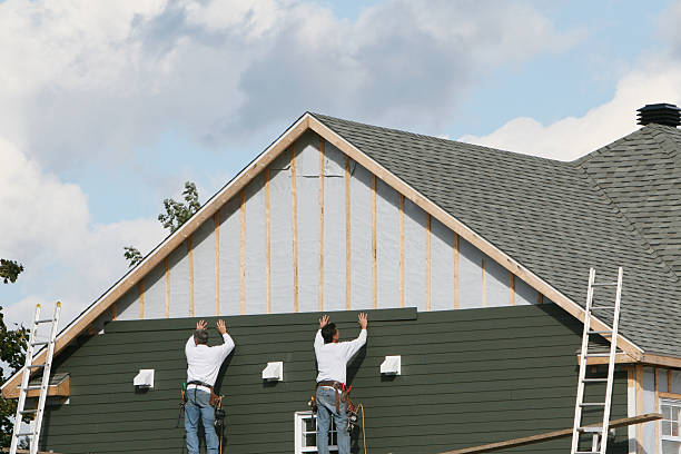Professional Siding Contractor technician working in Ostrander, OH